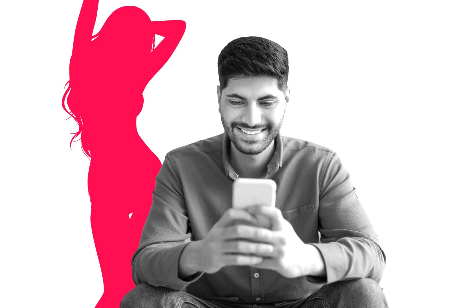 Guy smiling while he looks at his phone, with the silhouette of a woman dancing behind him.